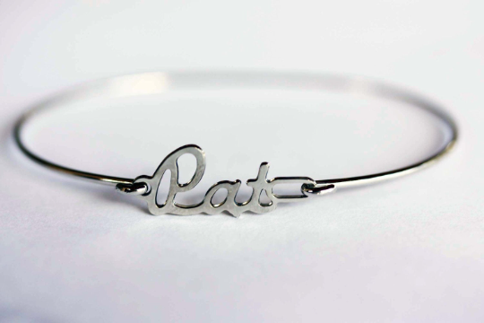 Vintage Pat silver name bracelet from Diament Jewelry, a gift shop in Washington, DC.