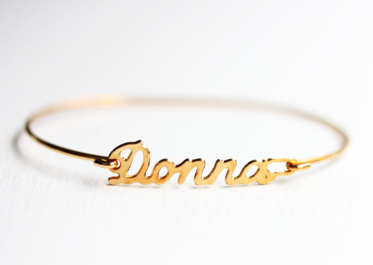 Vintage Donna gold name bracelet from Diament Jewelry, a gift shop in Washington, DC.