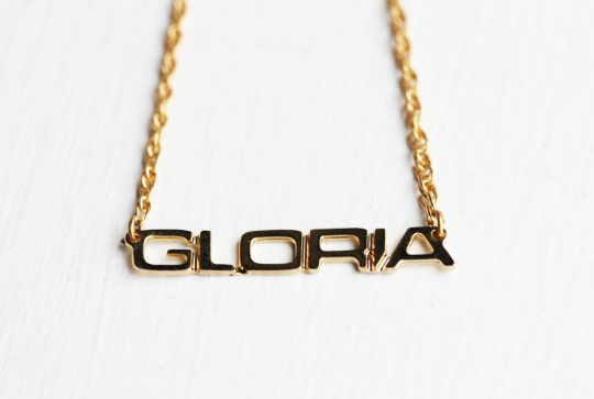 Vintage Gloria gold name necklace from Diament Jewelry, a gift shop in Washington, DC.