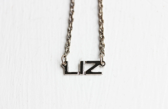 Vintage Liz silver name necklace from Diament Jewelry, a gift shop in Washington, DC.