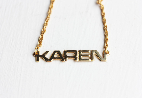 Vintage Karen gold name necklace from Diament Jewelry, a gift shop in Washington, DC.