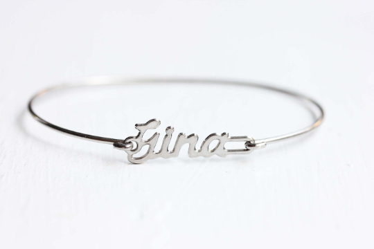 Vintage Gina silver name bracelet from Diament Jewelry, a gift shop in Washington, DC.