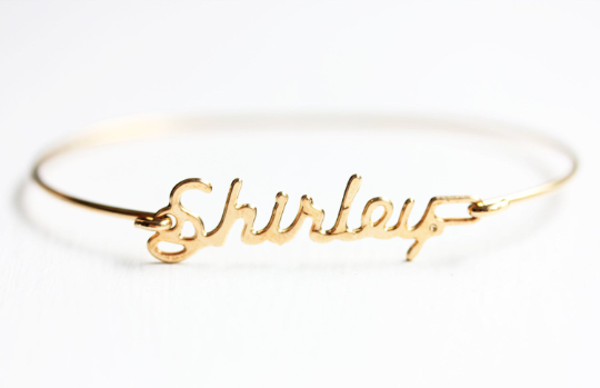 Vintage Shirley gold name bracelet from Diament Jewelry, a gift shop in Washington, DC.