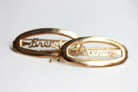 Vintage Brenda gold hair clips from Diament Jewelry, a gift shop in Washington, DC.