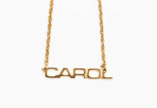 Vintage Carol gold name necklace from Diament Jewelry, a gift shop in Washington, DC.
