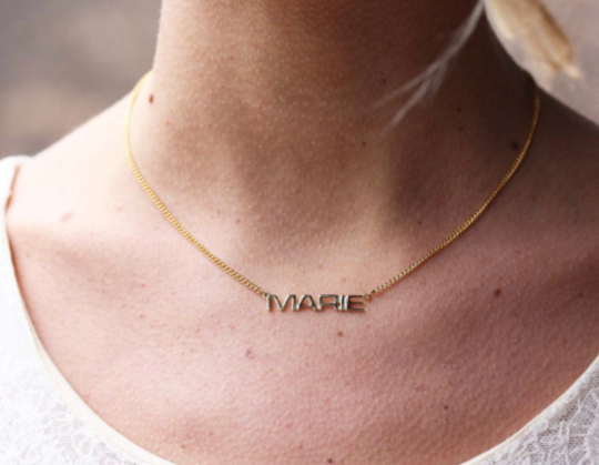Vintage Marie gold name necklace from Diament Jewelry, a gift shop in Washington, DC.