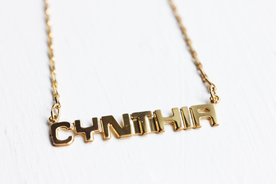 Vintage Cynthia gold name necklace from Diament Jewelry, a gift shop in Washington, DC.