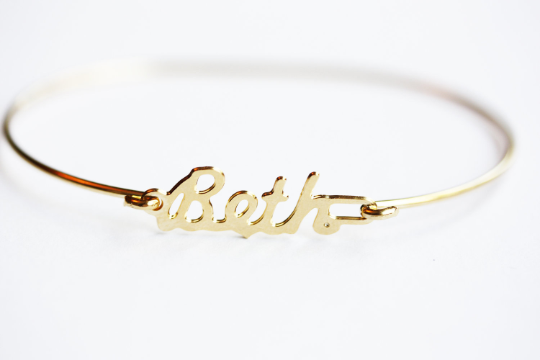 Vintage Beth gold name bracelet from Diament Jewelry, a gift shop in Washington, DC.