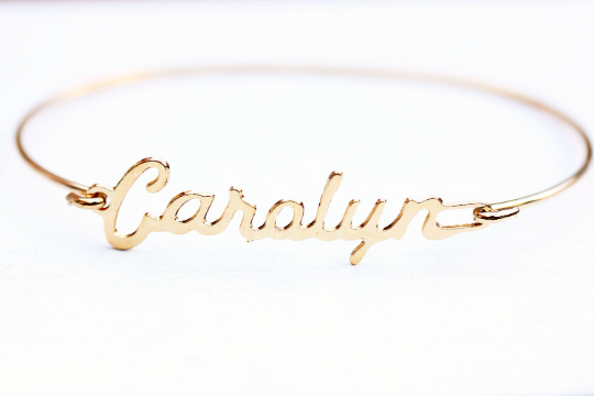 Vintage Carolyn gold name bracelet from Diament Jewelry, a gift shop in Washington, DC.