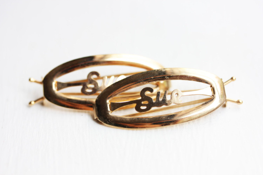 Vintage Sue gold hair clips from Diament Jewelry, a gift shop in Washington, DC.