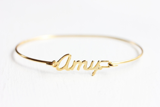 Vintage Amy gold name bracelet from Diament Jewelry, a gift shop in Washington, DC.
