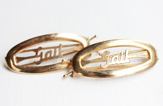 Vintage Gail gold hair clips from Diament Jewelry, a gift shop in Washington, DC.
