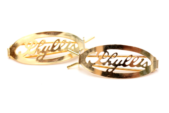 Vintage Phyllis gold hair clips from Diament Jewelry, a gift shop in Washington, DC.