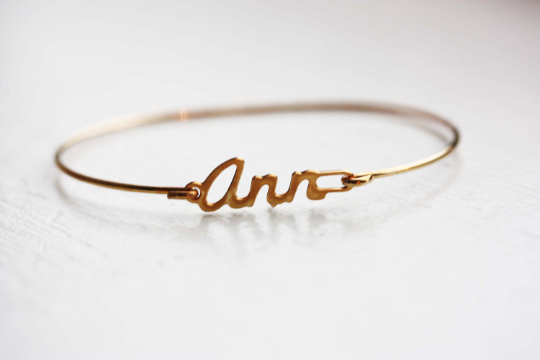 Vintage Ann gold name bracelet from Diament Jewelry, a gift shop in Washington, DC.