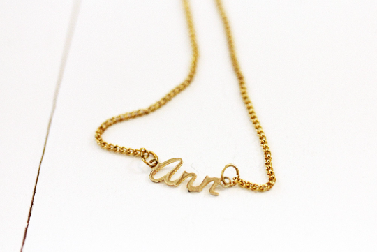 Vintage Ann gold name necklace from Diament Jewelry, a gift shop in Washington, DC.