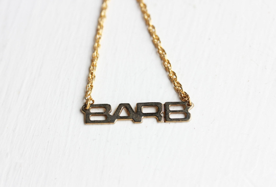 Vintage Barb gold name necklace from Diament Jewelry, a gift shop in Washington, DC.