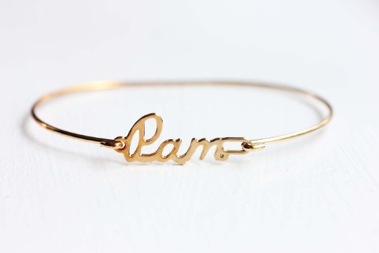 Vintage Pam gold name bracelet from Diament Jewelry, a gift shop in Washington, DC.