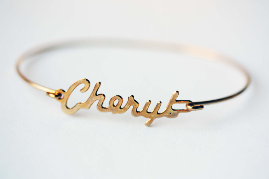Vintage Cheryl gold name bracelet from Diament Jewelry, a gift shop in Washington, DC.