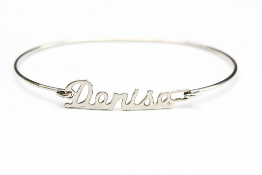 Vintage Denise silver name bracelet from Diament Jewelry, a gift shop in Washington, DC.