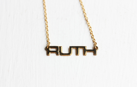 Vintage Ruth gold name necklace from Diament Jewelry, a gift shop in Washington, DC.