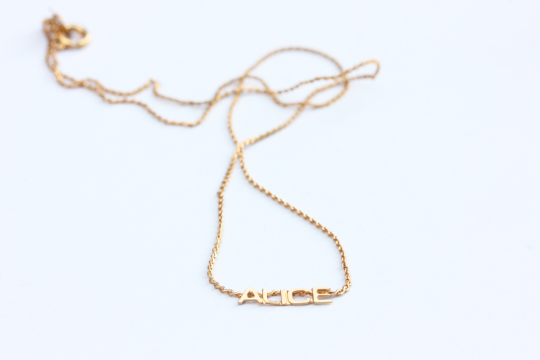 Vintage Alice gold name necklace from Diament Jewelry, a gift shop in Washington, DC.