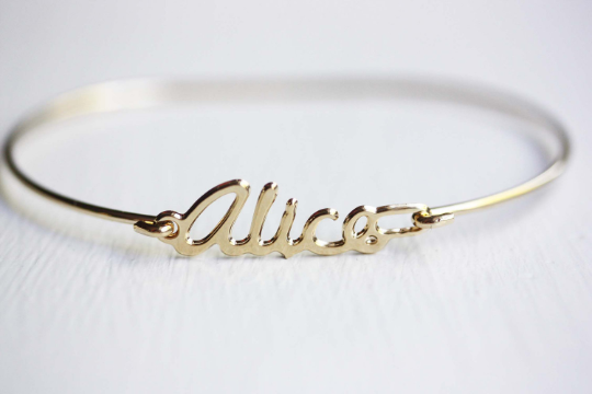 Vintage Alice gold name bracelet from Diament Jewelry, a gift shop in Washington, DC.