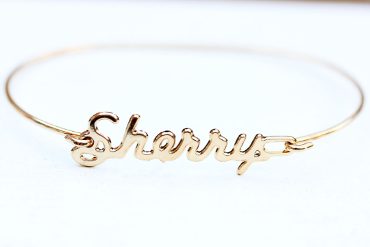 Vintage Sherry gold name bracelet from Diament Jewelry, a gift shop in Washington, DC.