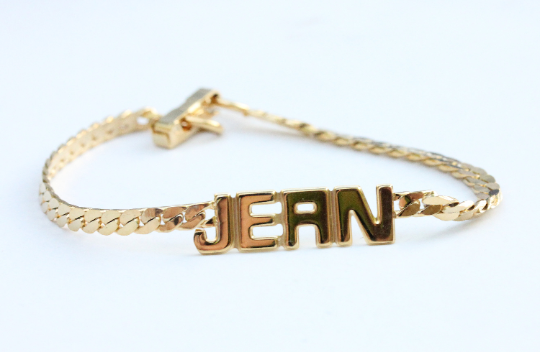 Vintage Jean Gold Name Bracelet from Diament Jewelry, a gift shop in Washington, DC.