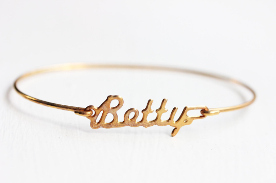 Vintage Betty gold name bracelet from Diament Jewelry, a gift shop in Washington, DC.
