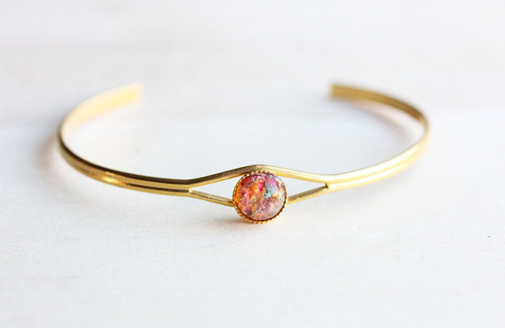 Opal dot gold bracelet from Diament Jewelry, a gift shop in Washington, DC.