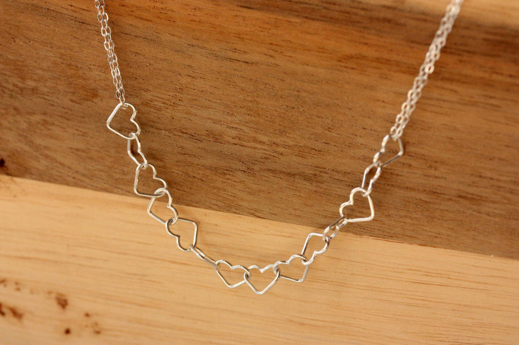 Silver heart links necklace from Diament Jewelry, a gift shop in Washington, DC.