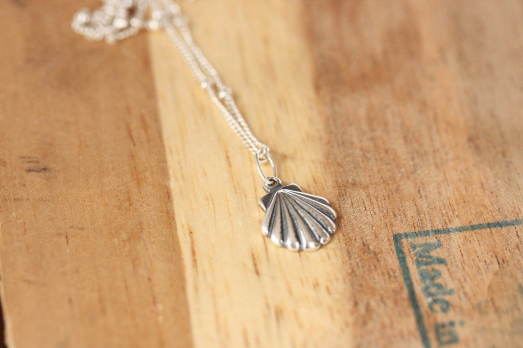 Pretty silver shell necklace from Diament Jewelry, a gift shop in Washington, DC.