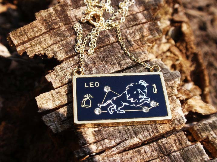 Leo zodiac gold charm necklace from Diament Jewelry, a gift shop in Washington, DC.
