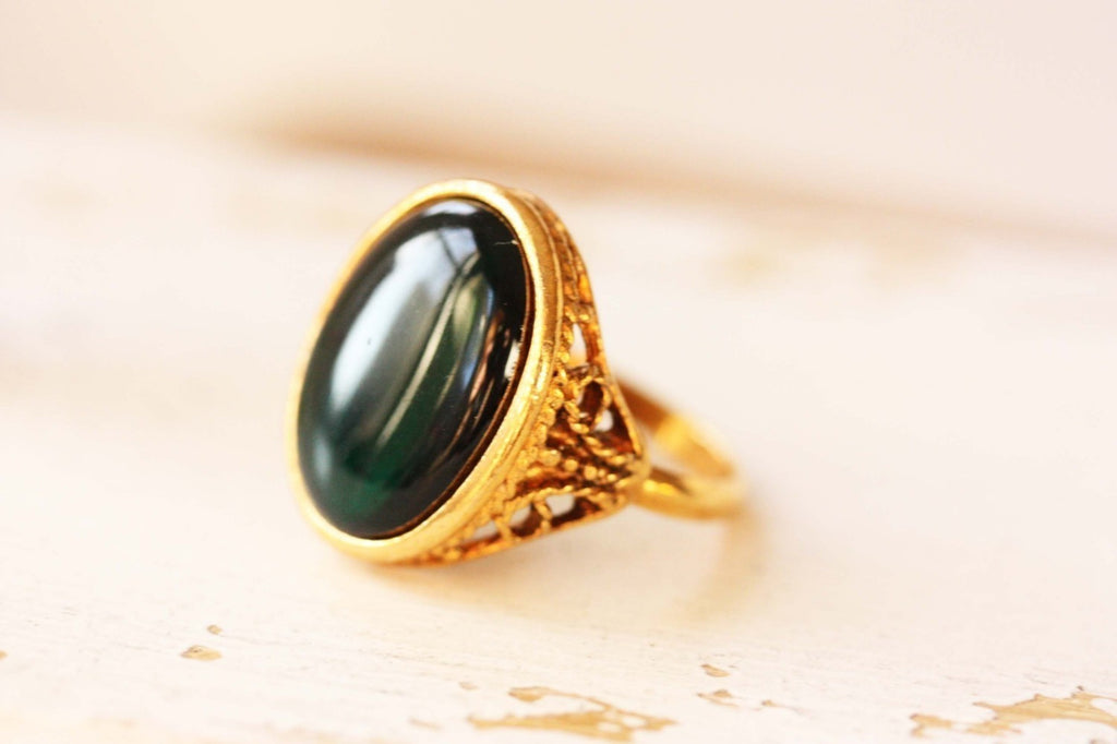 Green Resin Ring from Diament Jewelry, a gift shop in Washington, DC.