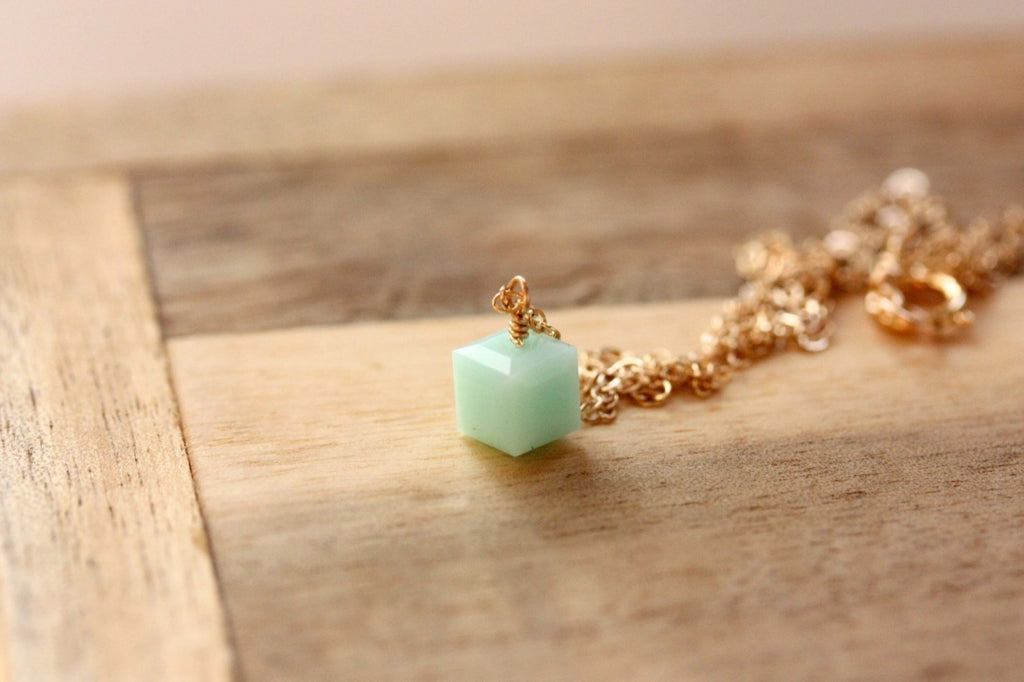 Turquoise swarovski square necklace from Diament Jewelry, a gift shop in Washington, DC.