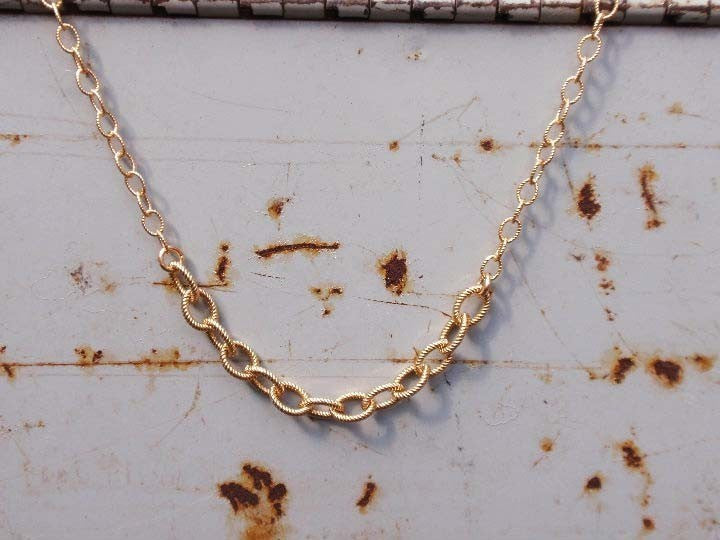 Nautical gold chain from Diament Jewelry, a gift shop in Washington, DC.