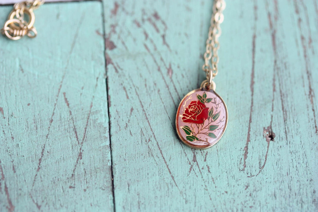 Rose oval gold necklace from Diament Jewelry, a gift shop in Washington, DC.