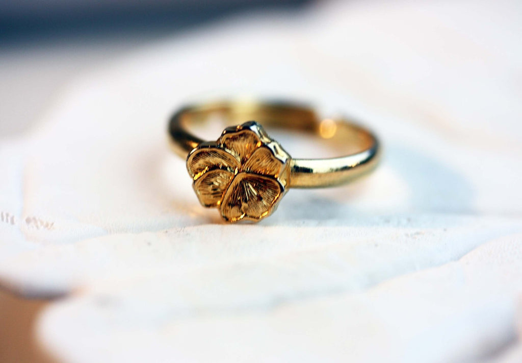 Tiny Gold Vintage Flower Ring from Diament Jewelry, a gift shop in Washington, DC.