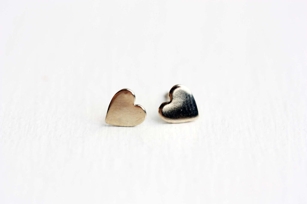 Gold heart studs from Diament Jewelry, a gift shop in Washington, DC.