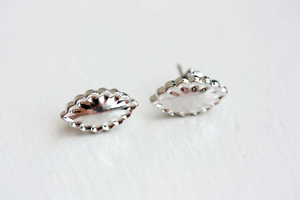 Silver paisley studs from Diament Jewelry, a gift shop in Washington, DC.