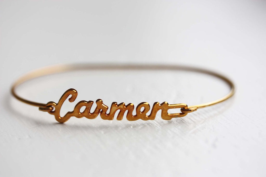 Vintage Carmen gold name bracelet from Diament Jewelry, a gift shop in Washington, DC.