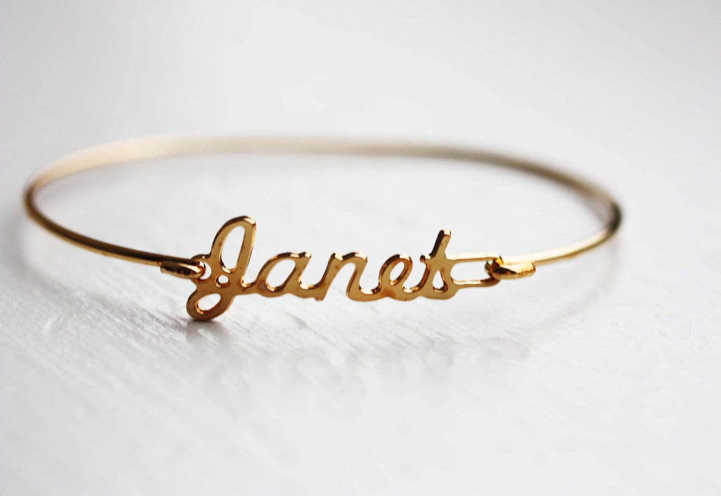 Vintage Janet gold name bracelet from Diament Jewelry, a gift shop in Washington, DC.
