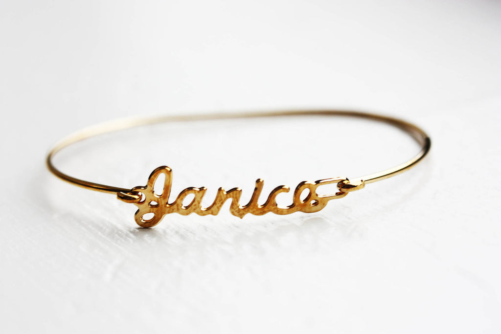 Vintage Janice gold name bracelet from Diament Jewelry, a gift shop in Washington, DC.