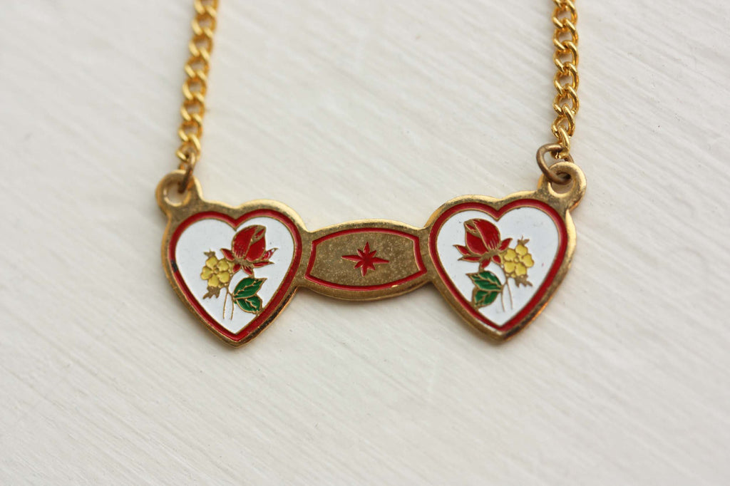 Double heart white red and gold necklace from Diament Jewelry, a gift shop in Washington, DC.