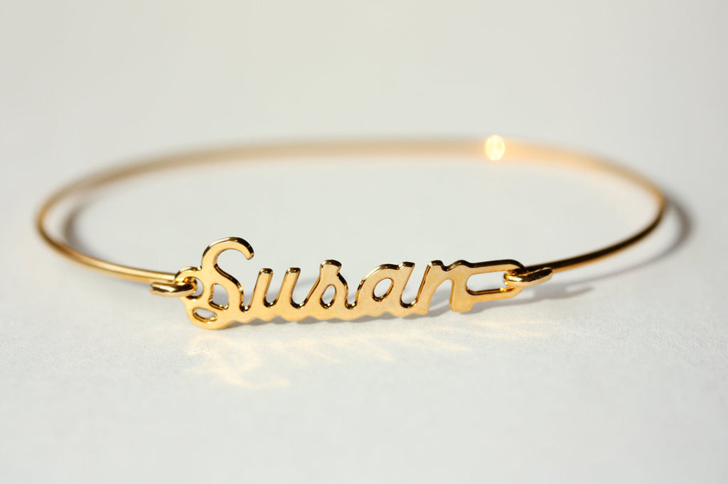 Vintage Susan gold name bracelet from Diament Jewelry, a gift shop in Washington, DC.