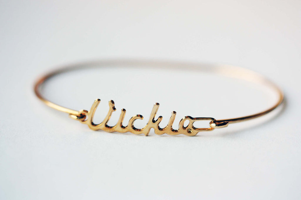 Vintage Vickie gold name bracelet from Diament Jewelry, a gift shop in Washington, DC.