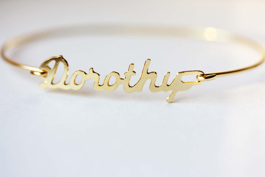 Vintage Dorothy gold name bracelet from Diament Jewelry, a gift shop in Washington, DC.