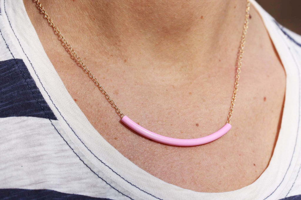 Pink tube gold chain necklace from Diament Jewelry, a gift shop in Washington, DC.