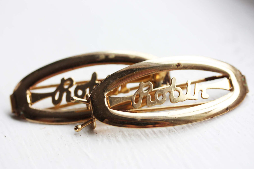 Vintage Robin gold hair clips from Diament Jewelry, a gift shop in Washington, DC.
