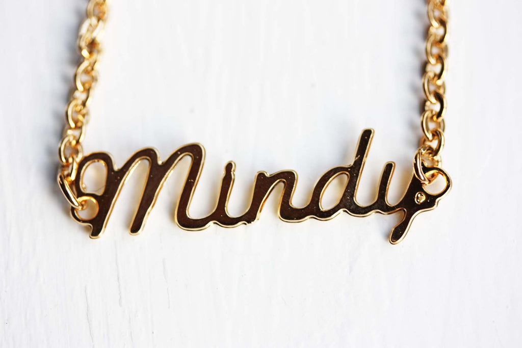 Vintage Mindy gold name necklace from Diament Jewelry, a gift shop in Washington, DC.
